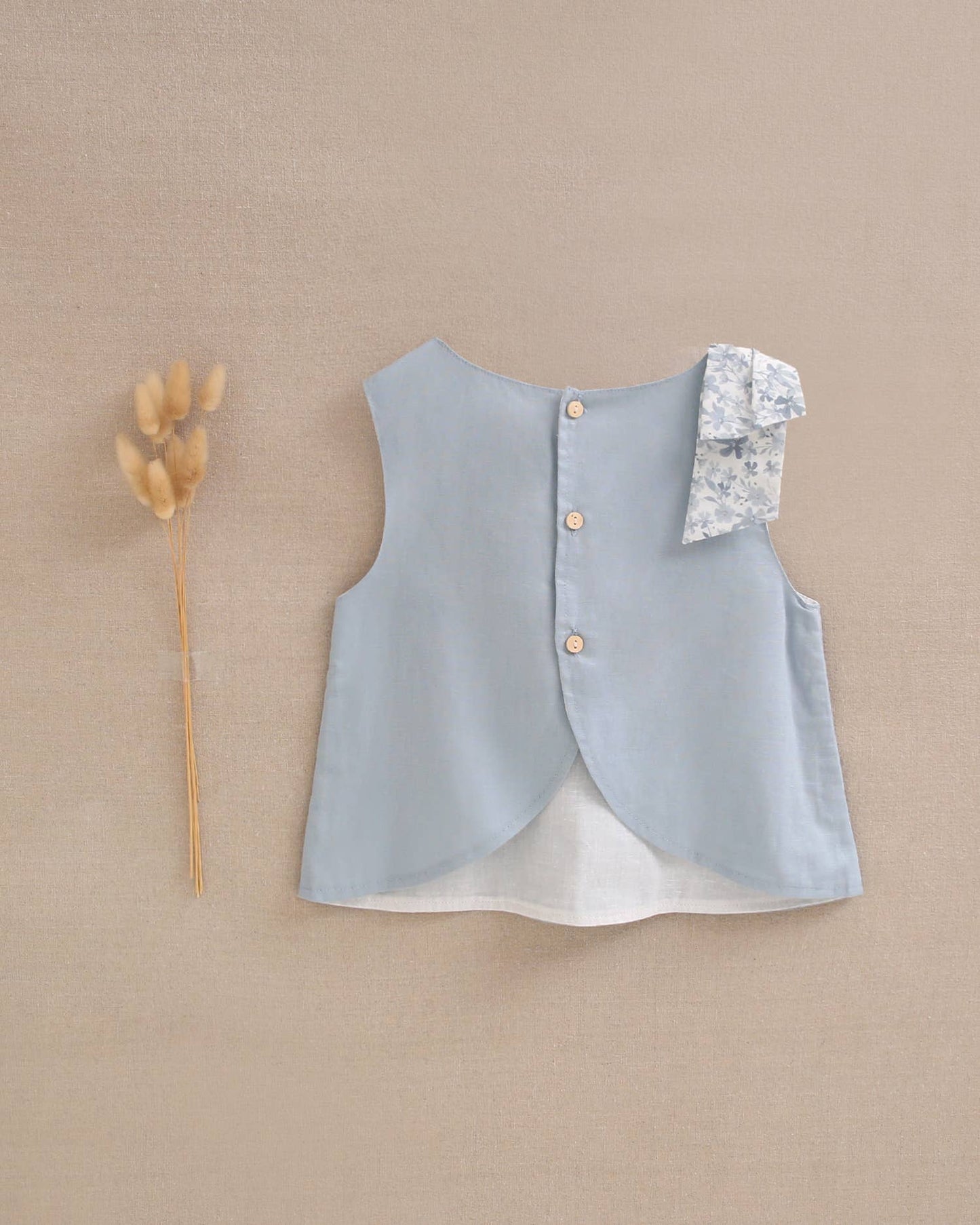 Blue Blouse With Floral Bow